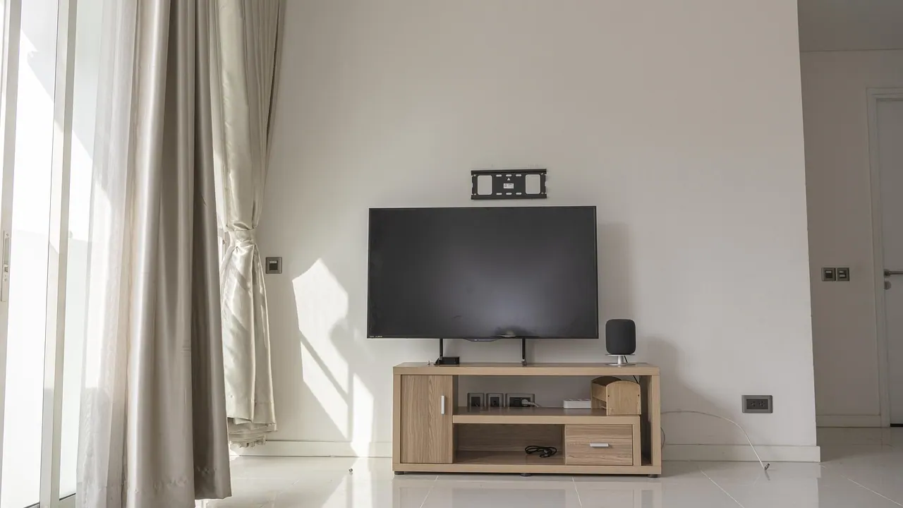 furniture, room, interior design, indoors, electronics, wall, living room, entertainment center, bedroom, shelf, table, refrigerator, floor, television, house, sink, curtain, floor