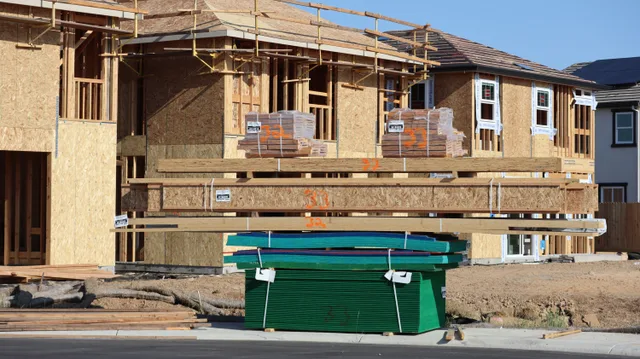 Wood frames and materials at a construction site for new homes in Elk Grove, California. How Vancouver laneway house rules shape a compact secondary suite